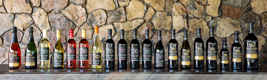 long row of wine bottles lined up
